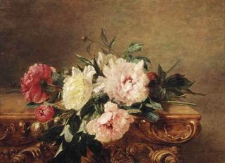 Red, white and pink peonies on a decorated marble ledge