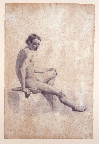 Nude sitting man