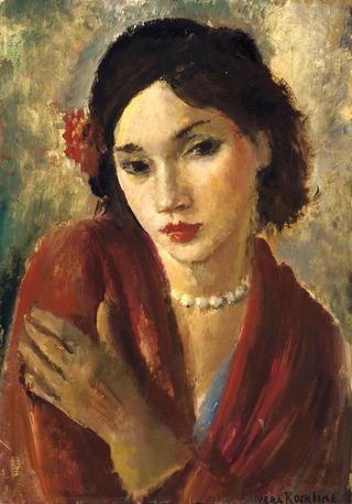 An elegant lady with a pearl necklace
