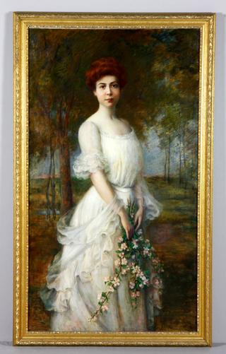 Woman Holding Spring Blossoms in a Landscape