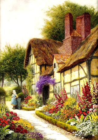 A cottage garden in full bloom with a young girl standing by a gate