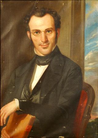 Portrait of a Seated Gentleman with Glasses holding a Book