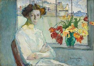 Woman and flowers in the window