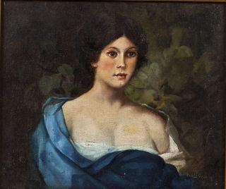 Portrait of a young woman wearing blue