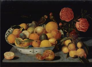 Still life of fruit in a Wanli bowl with a pomegranate, a bunch of oranges, roses and two parrots