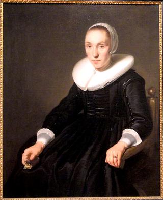 Portrait of a Young Woman with a Small Book