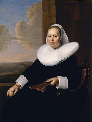 一个拿着扇子坐着的女人的画像
