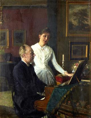 Actor Peter Jerndorff and his wife Amalie at the piano