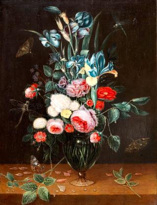 Irises, Roses and other Flowers in a Glass Vase on a Wooden Table with Butterflies and Dragonflies