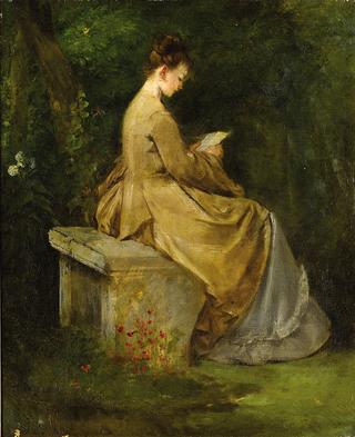 Lady reading on a bench