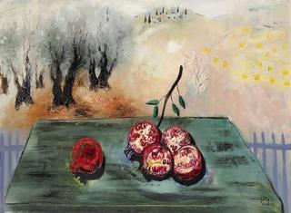 Pomegranates On Green Table