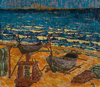 Boats anchored on beach