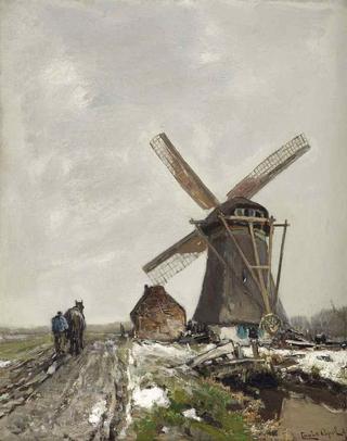 A Snowy Polder Landscape with a Windmill