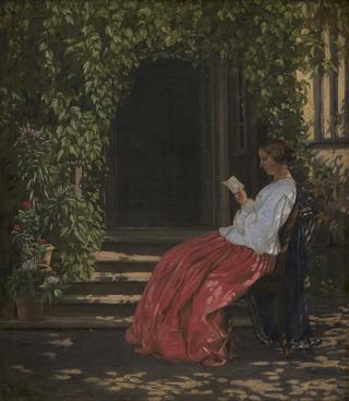 在花园里读书的女士