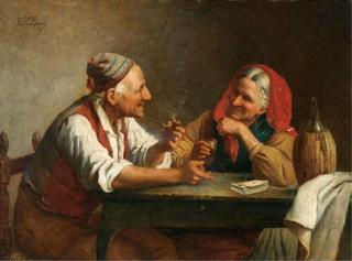 Elderly couple seated at a table with a deck of cards, and a bottle of Chianti