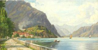 Mountain scenery with houses and boats at Lago di Garda