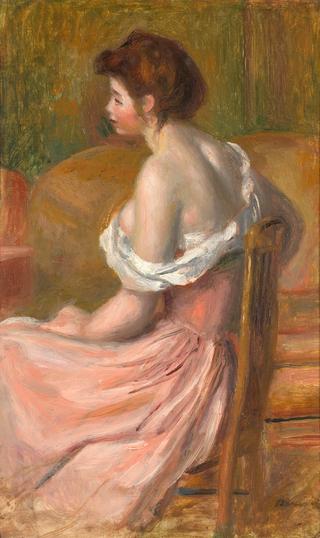 Young woman seated, with neck and shoulders uncovered
