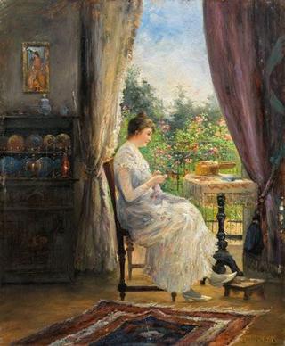 A Young Woman Sewing