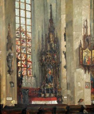 The Interior of a Cathedral with a Stained Glass Window and Decorated Font