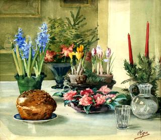 A laid table decorated with flowers
