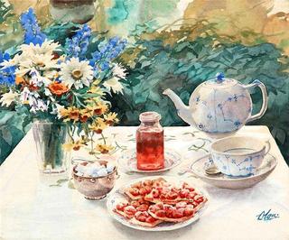 Garden table with china, flowers and pie