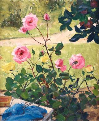 Still life with roses and blue knitting