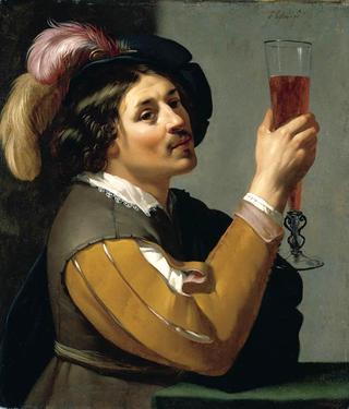 Young Man Drinking a Glass of Wine