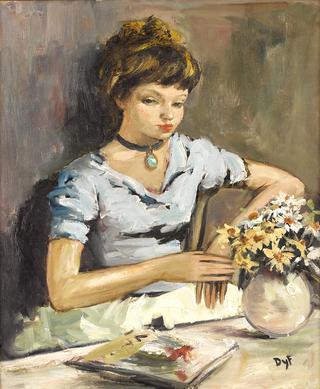 Young girl by a table with flowers