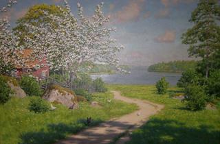 Cottage with flowering fruit trees and lake
