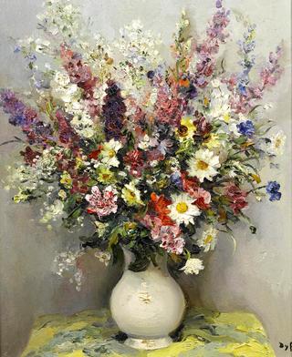 Summer flowers in a translucent vase