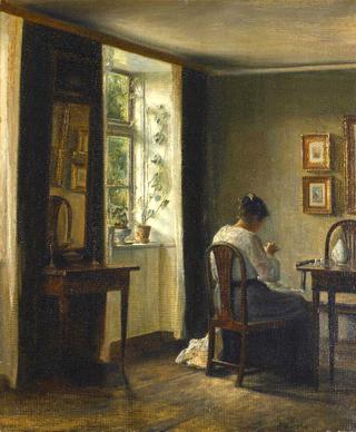 Seamstress Sewing in an Interior