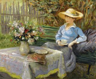 Young woman seated on the bench