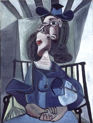 Woman with Hat Seated in an Armchair