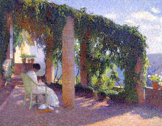 Woman sewing on a veranda