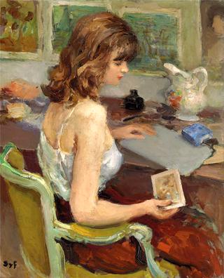 Young woman with a print card