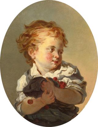 Young Boy Holding Cherries