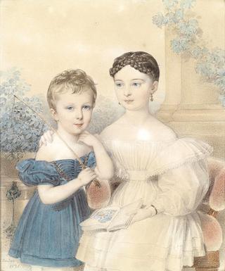 Portrait of a boy and a girl, holding a picture book