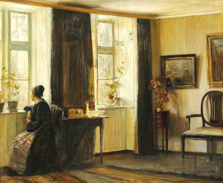 Interior with the artist's wife at the window