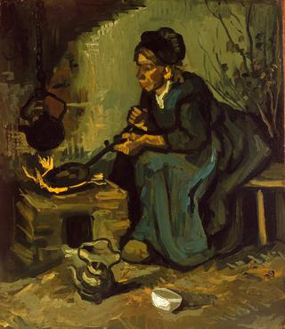 在壁炉旁做饭的农妇
