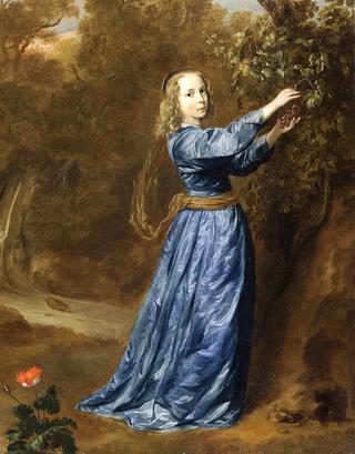 Portrait of a girl picking grapes