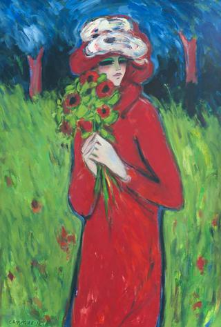 Standing lady wearing a red coat and hat