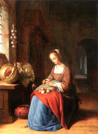 A Young Woman Preparing Vegetables in a Kitchen