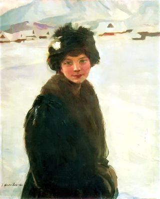 Portrait of a young girl on the background of a winter landscape