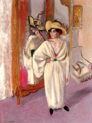 Woman in White in front of a Mirror