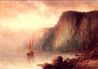 Sunlit Coastal Cliffs and Sea