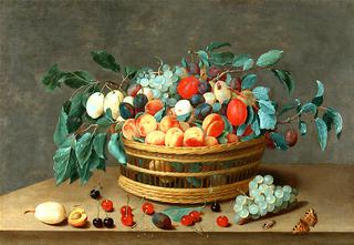 Basket with fruit and plum leaves