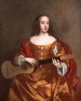 A Young Woman Playing a Guitar