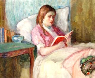 Young Woman Reading in Bed