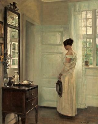 Woman in an Interior with a Mirror