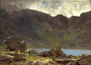 A Mountainous Lake Scene with Rocks in the Foreground